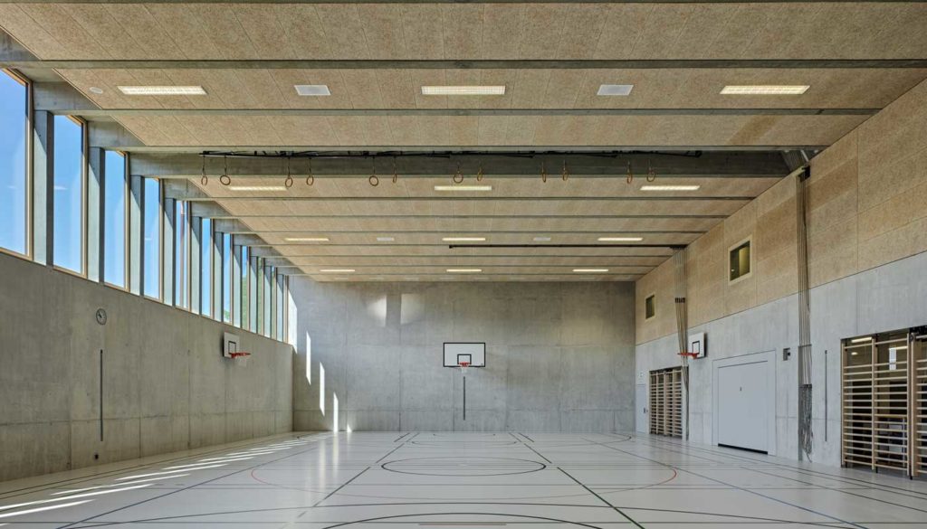 An exposed concrete basement gymnasium built with Drytech White Tank waterproofing.