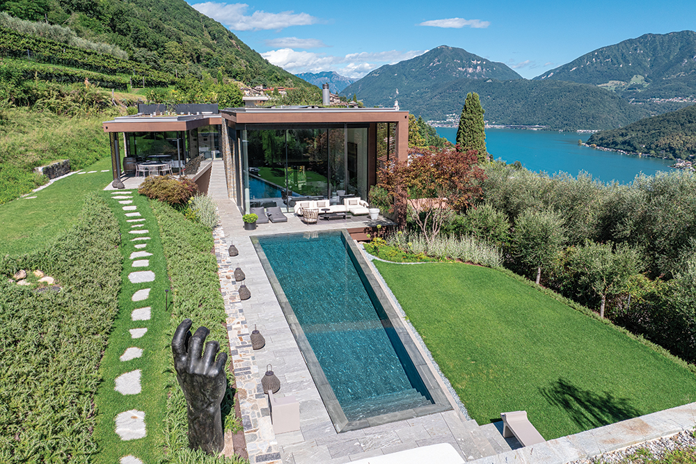 The swimming pool with sculpture.